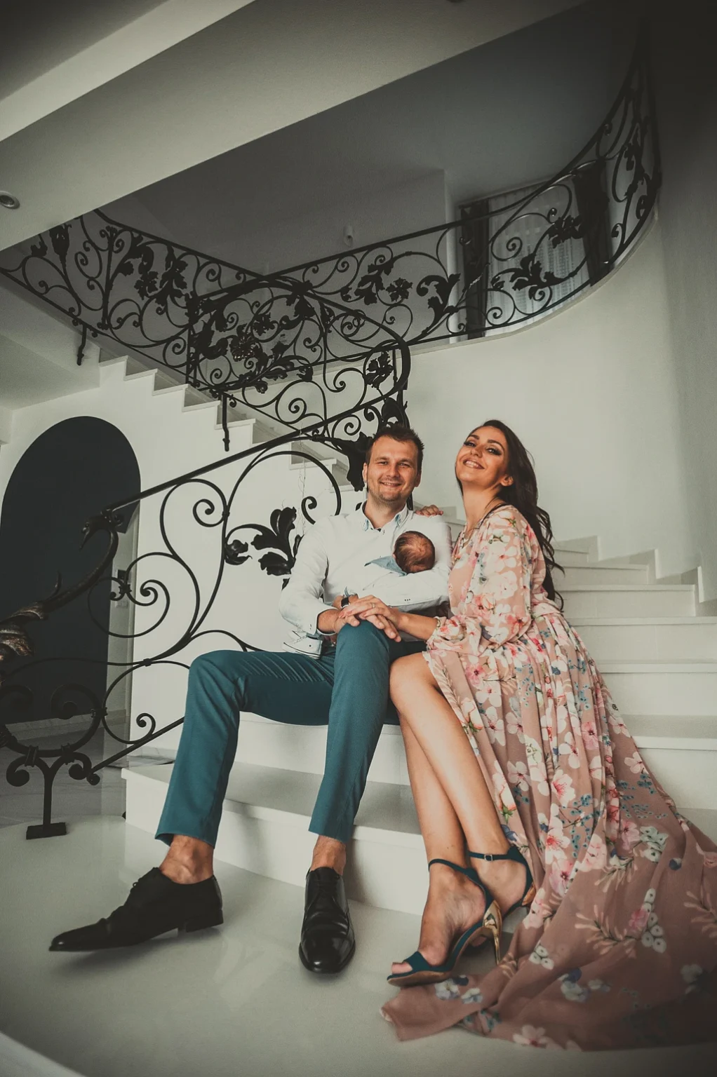 Family photo shoot at their home in Vienna. The image captures the family in a comfortable and personal setting, showcasing their togetherness and warmth.