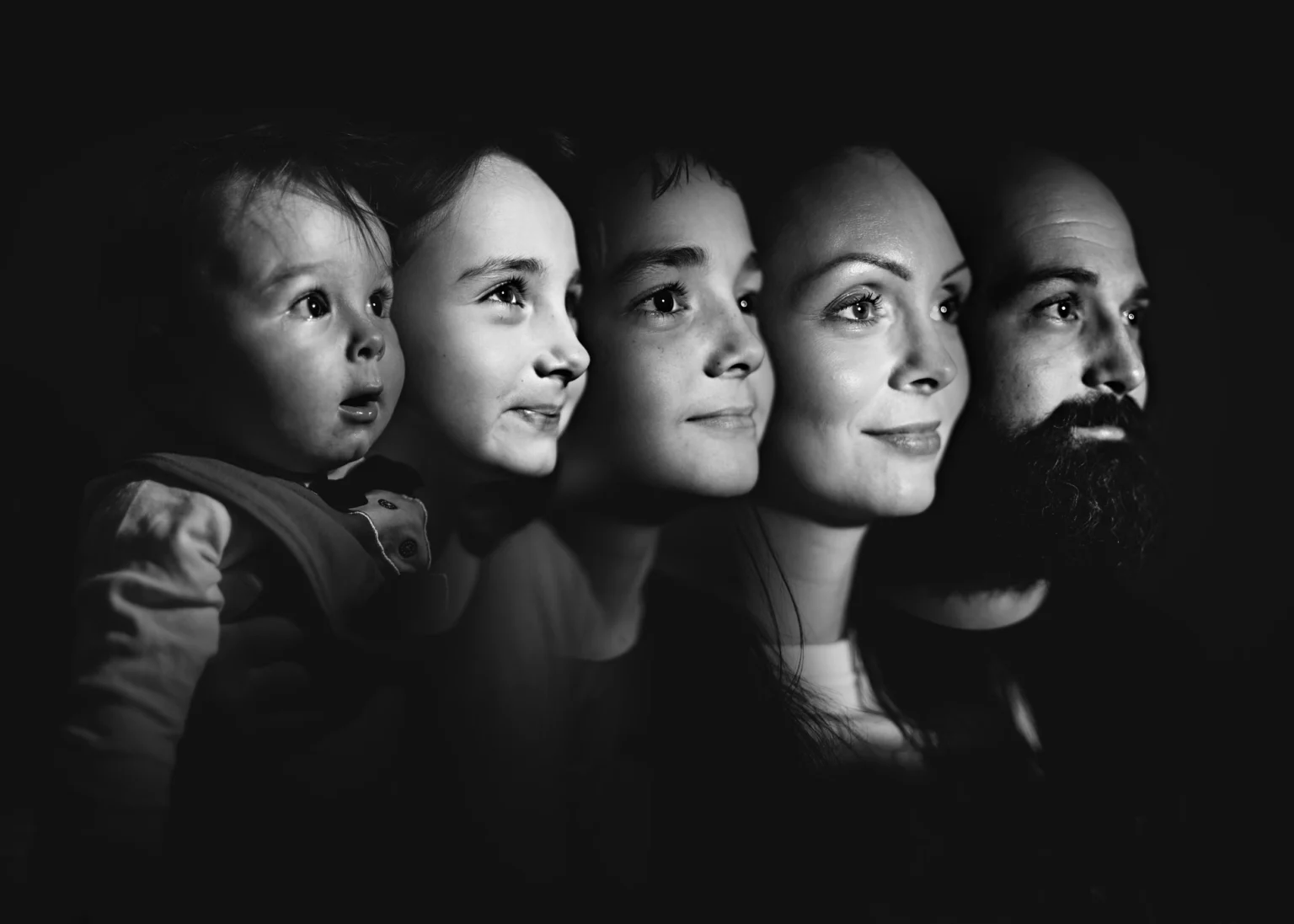 Family headshot created in Photoshop featuring a dad, mom, and three kids. The image shows the family posed together with a cohesive and polished look