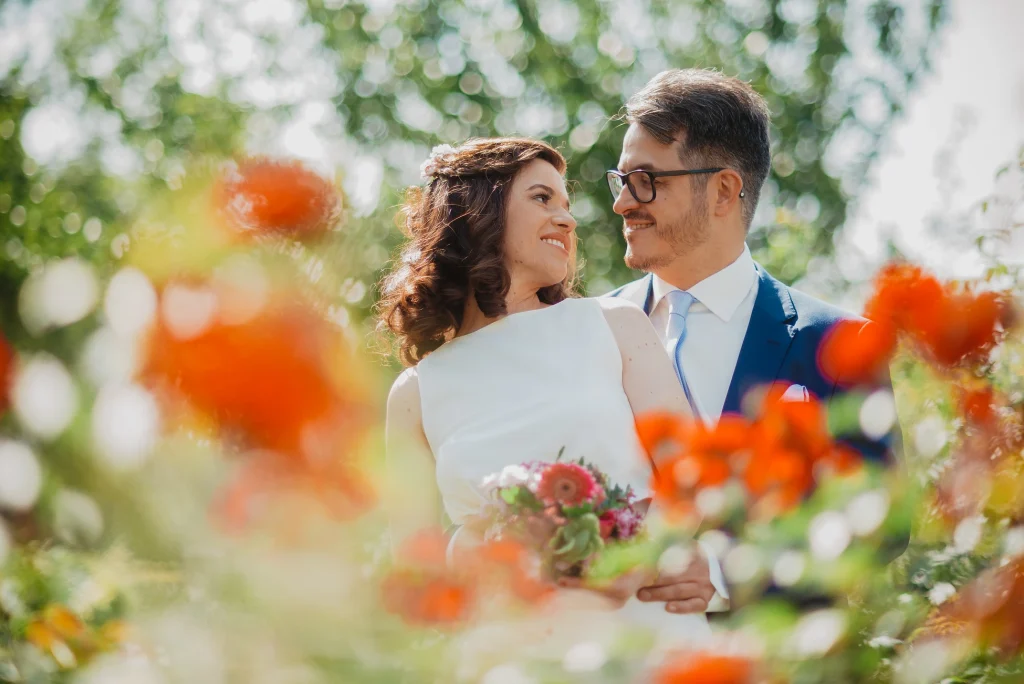 Bride and groom enjoying their wedding on Donauinsel (Danube Island) in Vienna, Austria. The picturesque landscape, including the river and natural surroundings, creates a stunning backdrop for their special day.