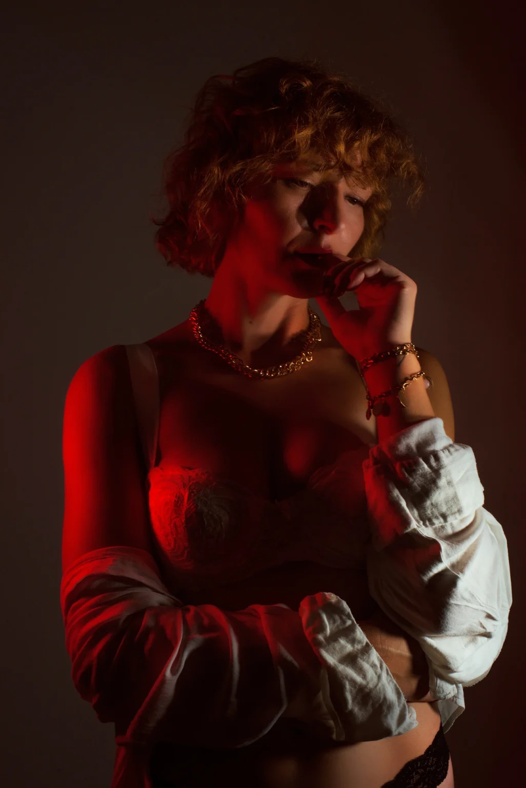 Sexy boudoir studio portrait in Vienna. The image showcases a sensual and elegant portrayal of the model, captured in a professional studio setting